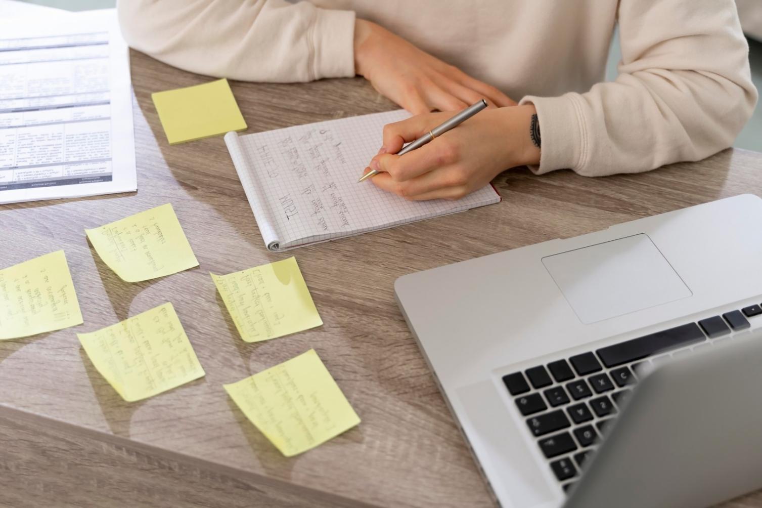 Business professionals analyzing financial data and cost management strategies in modern office setting